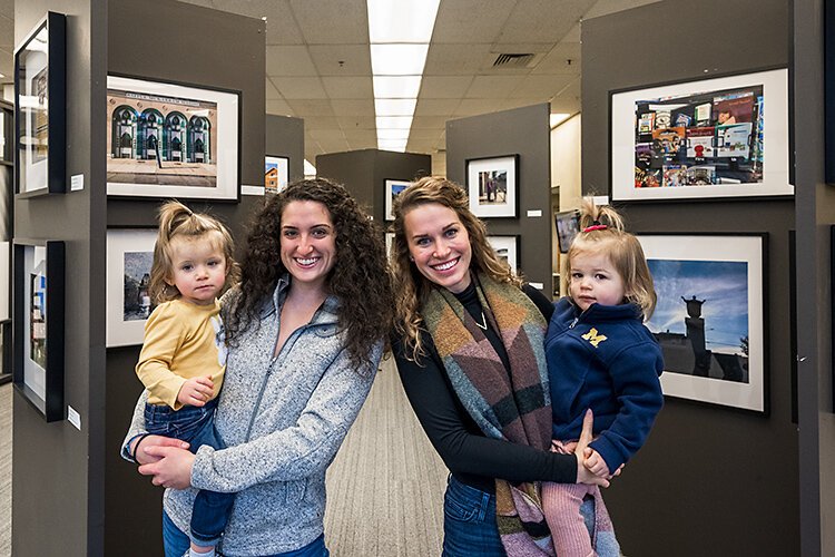 Kerrigan Fitzpatrick and Alyssa Shumaker of optiMize with their daughters.