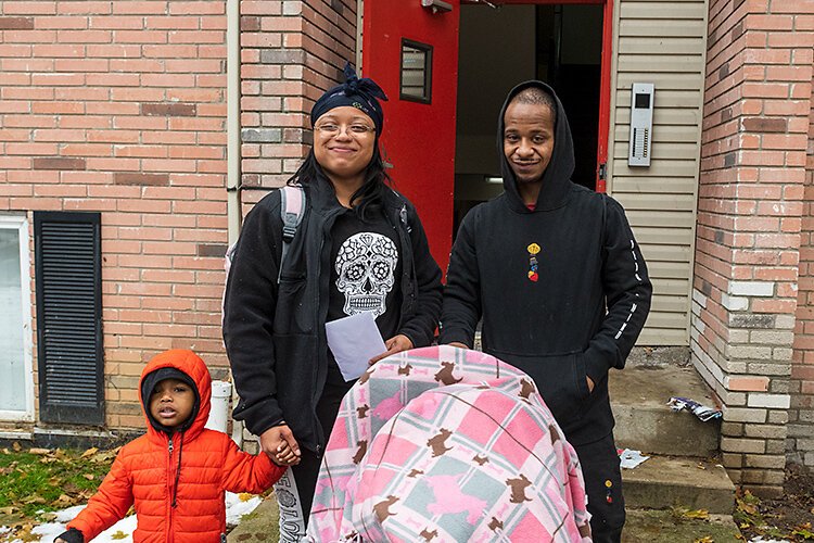 Britanni Brooks outside her Ypsilanti apartment.