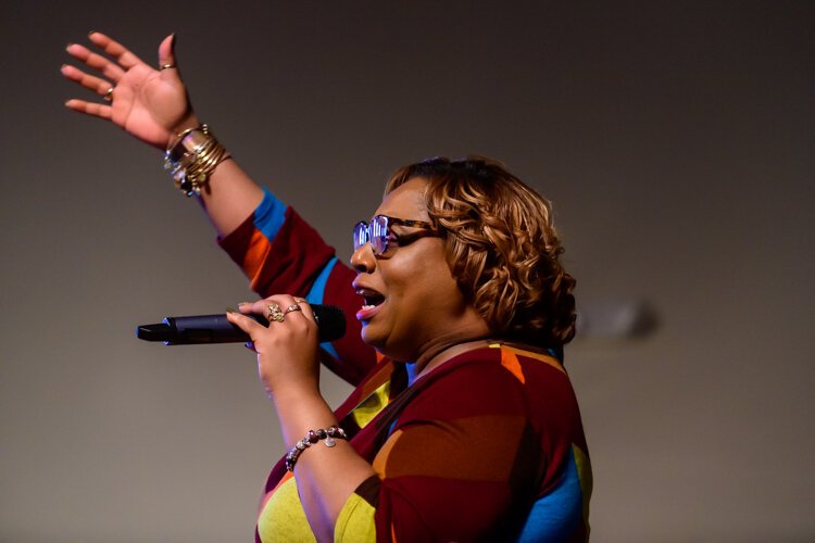 Monica Hartman leading a worship team practice at Christian Love Fellowship.