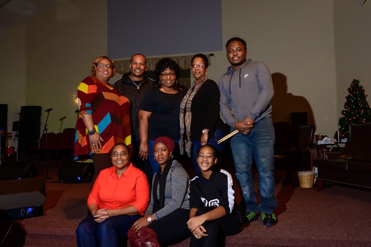 Monica Hartman with the worship team during a practice at Christian Love Fellowship.