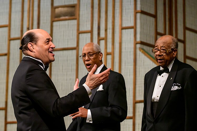 Dwight Fontenot leads the Men's Choir at Community Church of God.