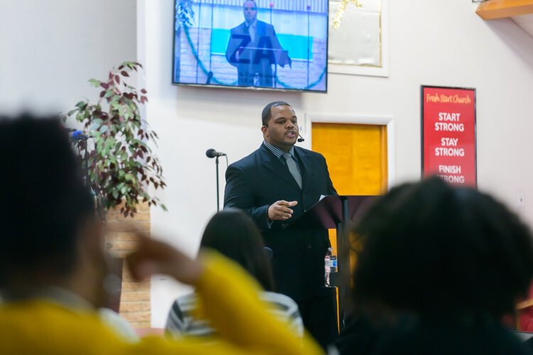 Pastor Gregory Cannon leading Sunday Service at Fresh Start Church.