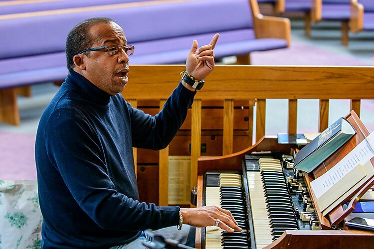 Brown Chapel AME Music Director John Woods at a Friday service.