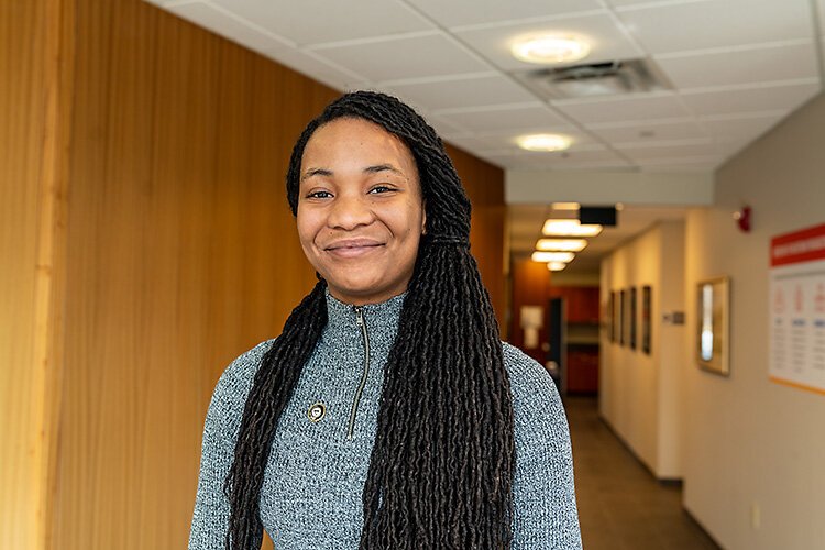 AmeriCorps financial stability service member Tien Holmes.