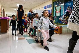 Children with Bottles-N-Backpacks at the Chapelle Business Center.