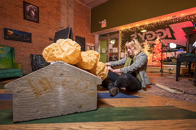 Ypsilanti Art Incubator's Alexa Dietz with her sculpture "Monopoly" at Ziggy's.