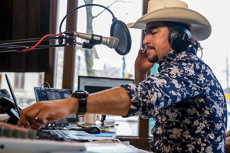 Javier Aquino during Contacto Michigan's El Pariente show in downtown Ypsilanti.