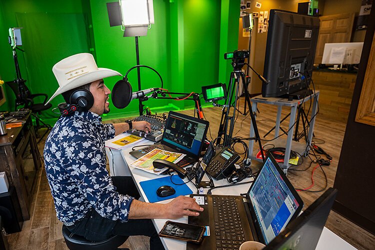 Javier Aquino during Contacto Michigan's El Pariente show in downtown Ypsilanti.