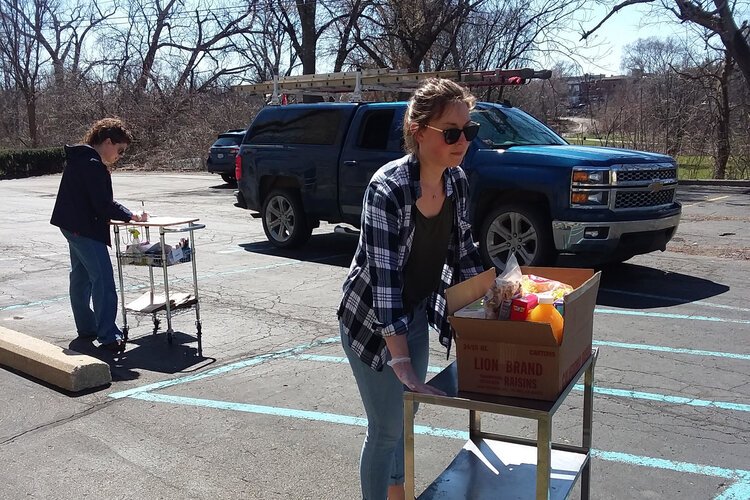 Volunteers prepare to distribute food at Emmanuel Lutheran Church.