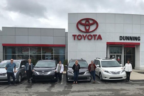 Representatives of Ypsilanti Meals on Wheels, Michigan Ability Partners, and Saline Area Social Service pick up their new vehicles.