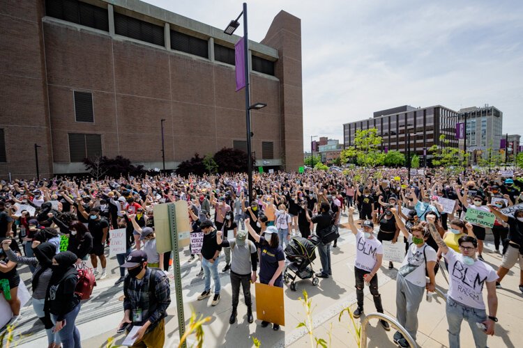 Protestors gather at the Ann Arbor Municipal Center.