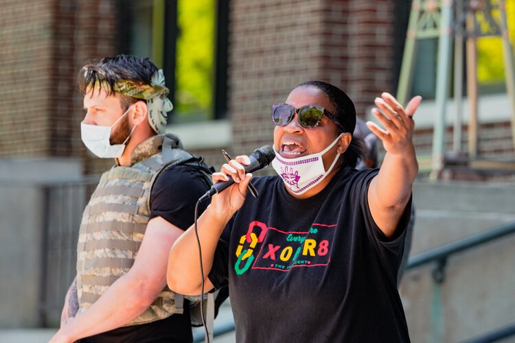 Organizer Trische' Duckworth speaks at the protest.