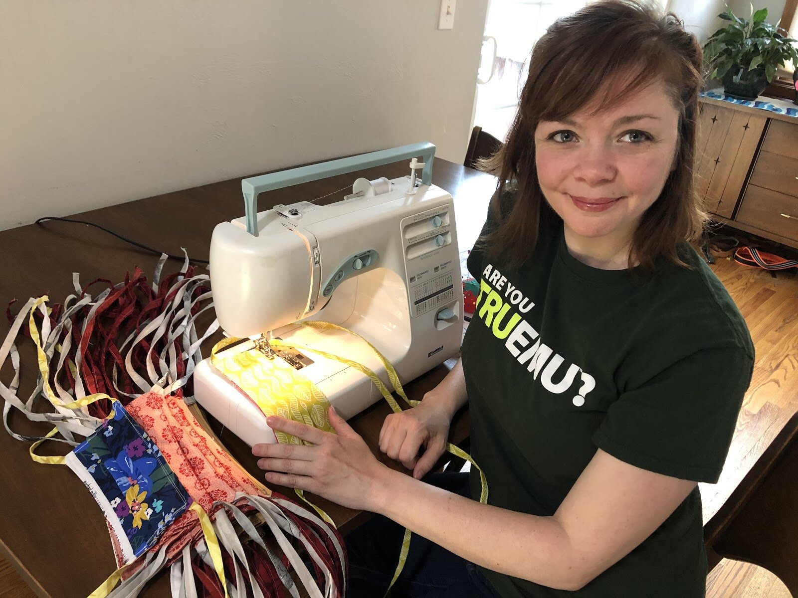 Tricia McTague, an associate professor of sociology at EMU and member of EMU's volunteer sewing cohort, sews masks.