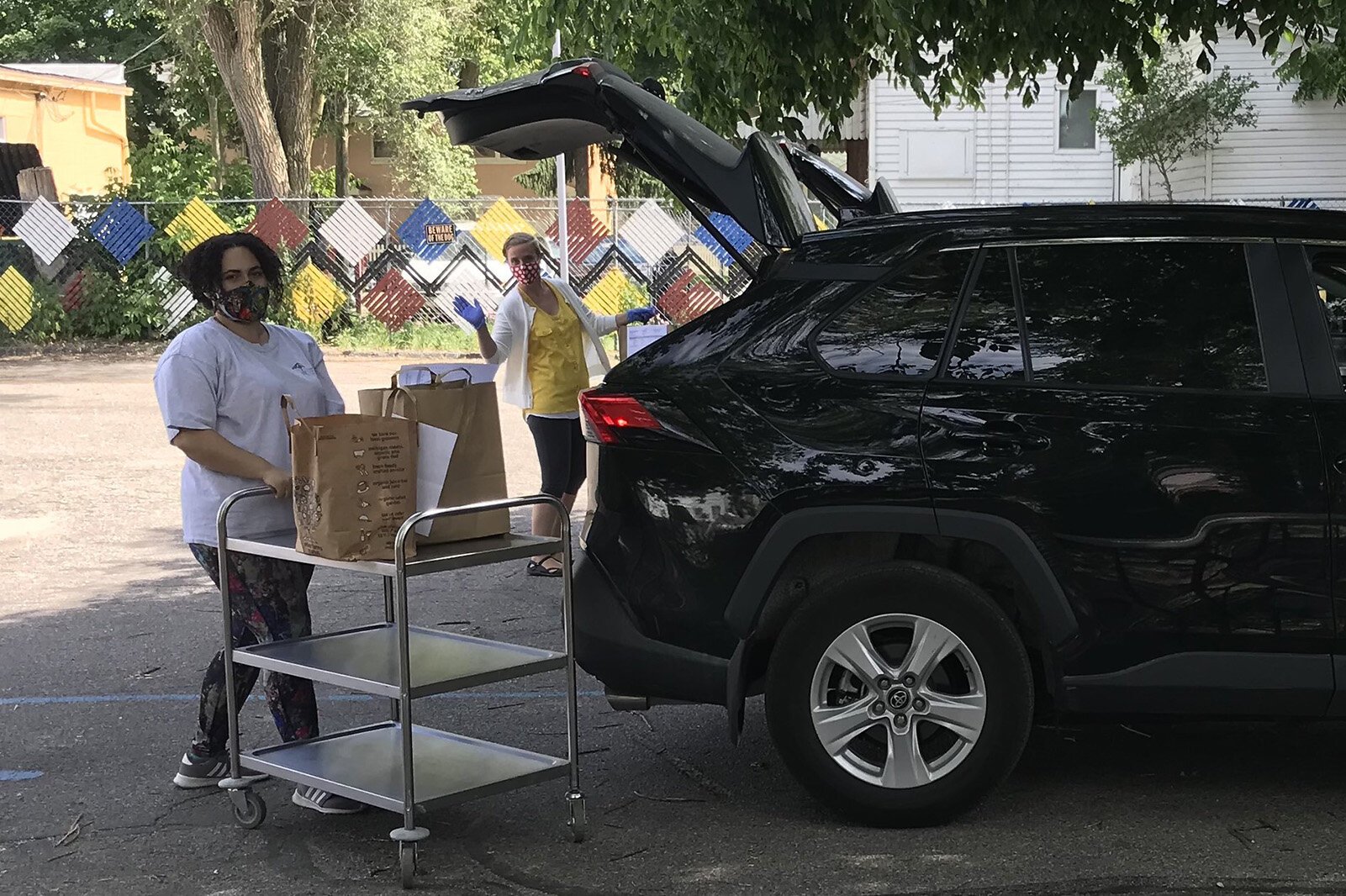 Growing Hope staff have been using a contactless system to transfer groceries to customers' cars at the Ypsilanti Farmers Market.
