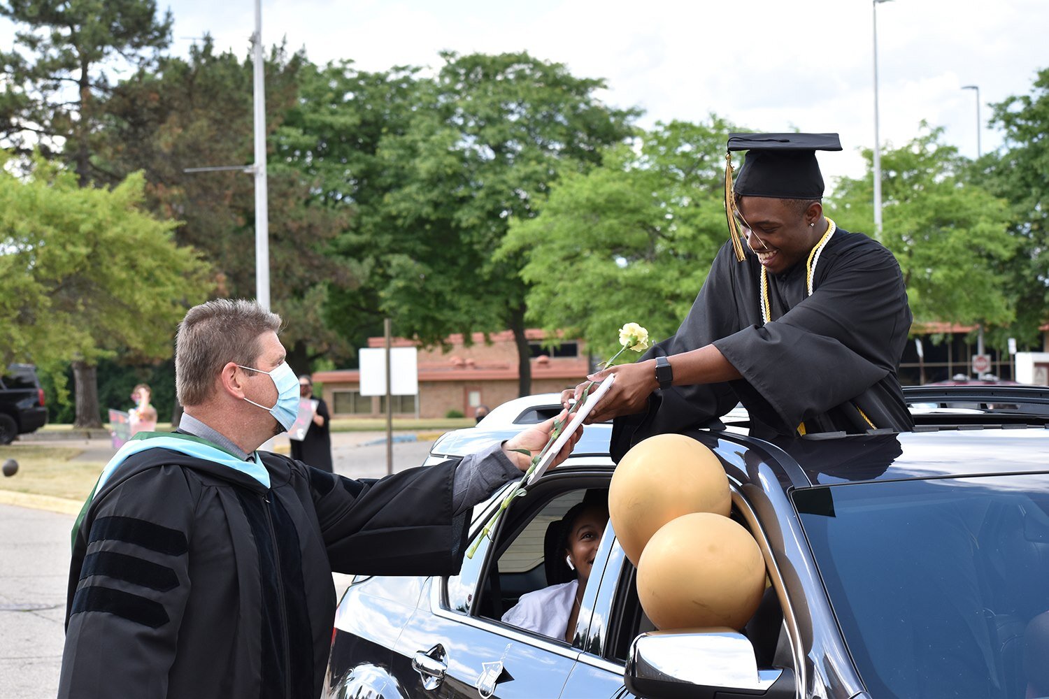 Ypsilanti Community High School students participated in a drive-through graduation ceremony this year.