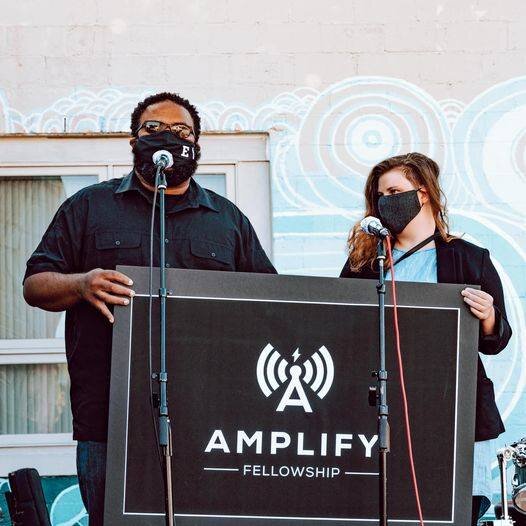 Rod Wallace of Grove Studios and Maia Evans of Leon Speakers announce the Amplify Fellowship at Grove Studios' Equinox Party.