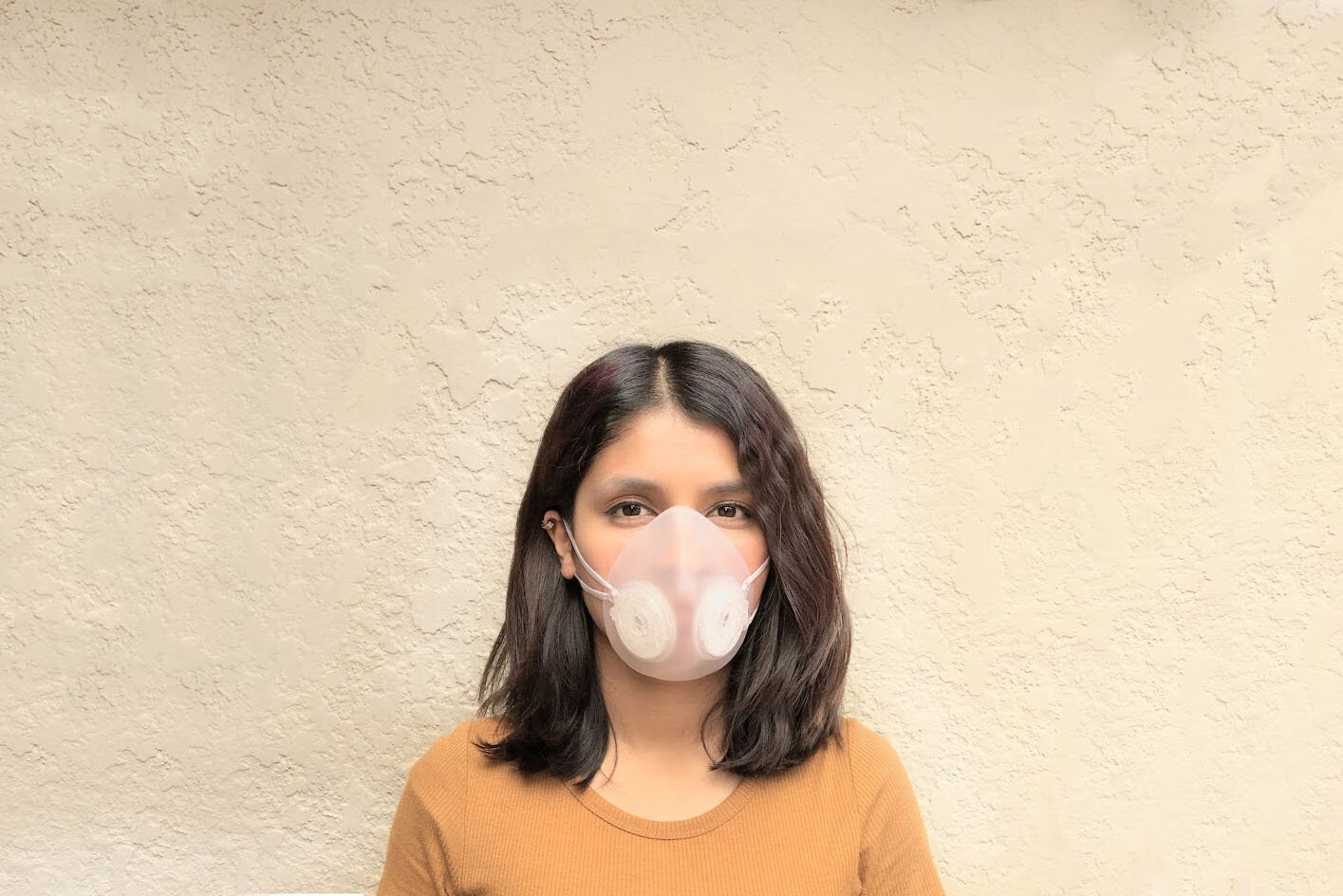 BreezeBubble founder Arohi Jain wears the flexible silicone mask she designed.