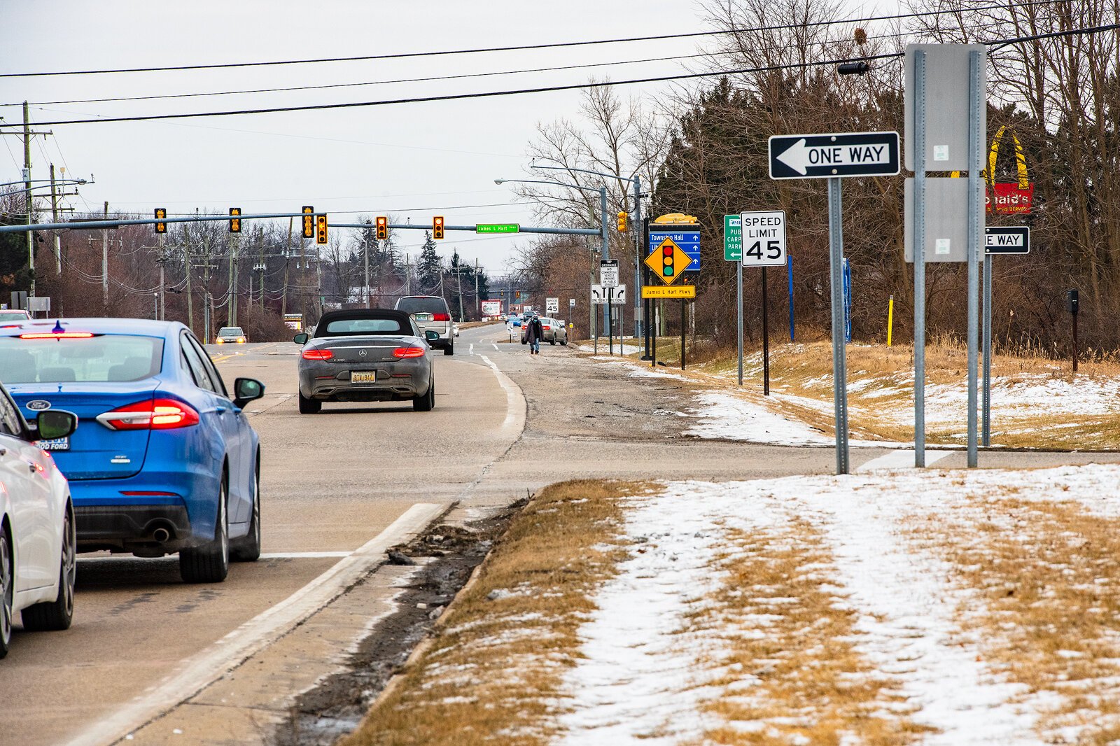 The footpath along Huron Street looking south by the eastbound I-94 exit.