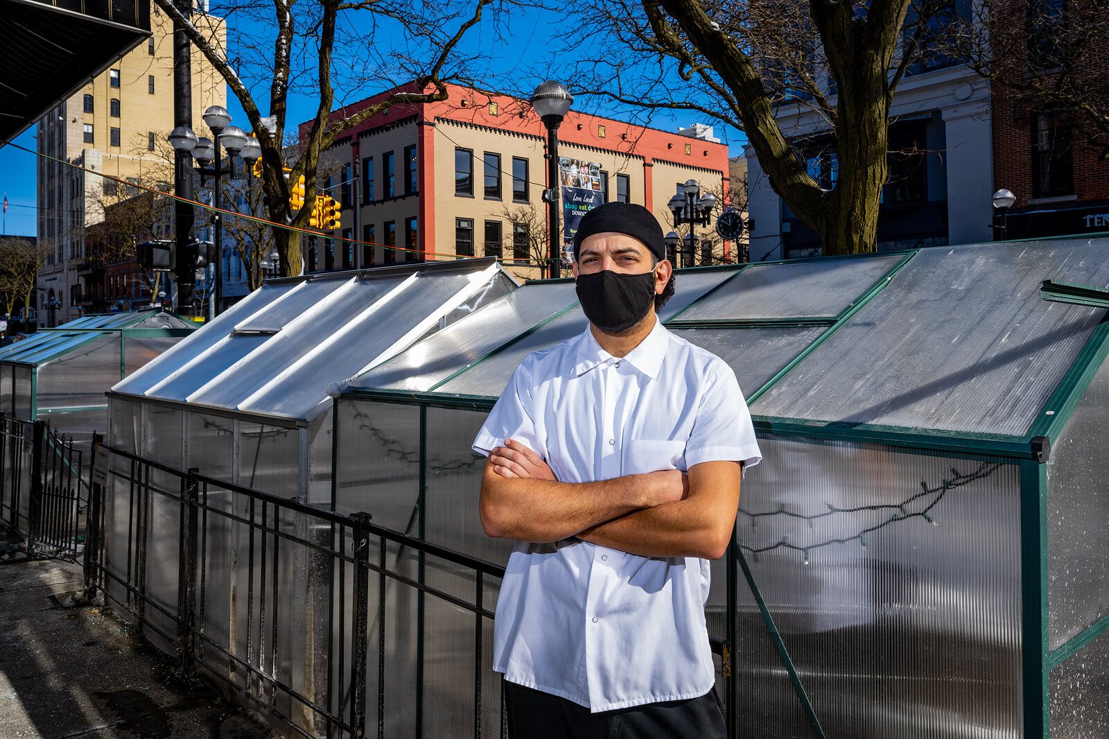 Executive Chef James Wilhelm by the Black Pearl's outdoor dining greenhouses.