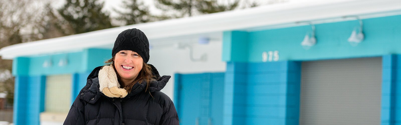 Friends of the Rutherford Pool Chair Jessica Faul outside of the Rutherford Pool bath house.