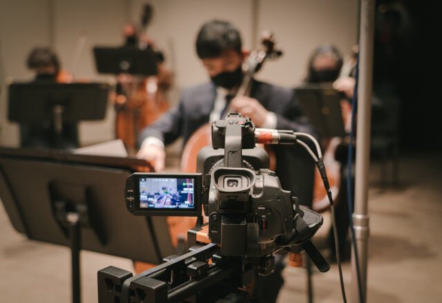 Cellist Benjamin Francisco performs at an Ann Arbor Symphony Orchestra concert being filmed for viewing online.