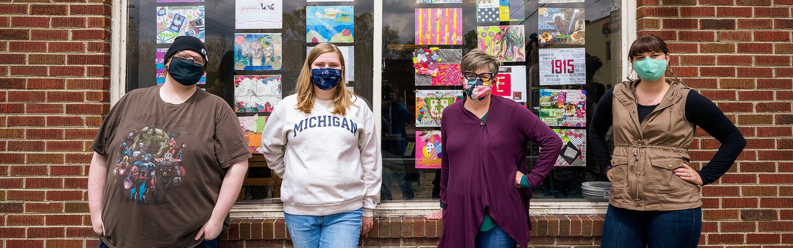 Samuel Justin Ringuette, Ashlyn Slaviero, Jill Jepsen, and Kate Williams from WCC install "Our Layers of Identity" at 734 Brewing Company for First Fridays.