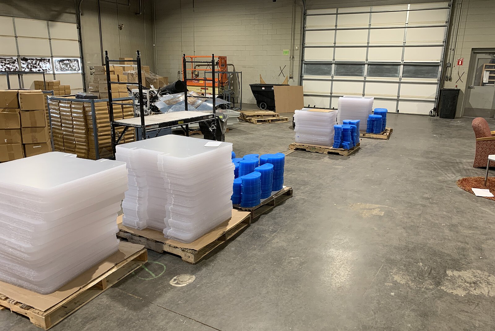 Germ shields waiting to be packed in BankSupplies' warehouse.