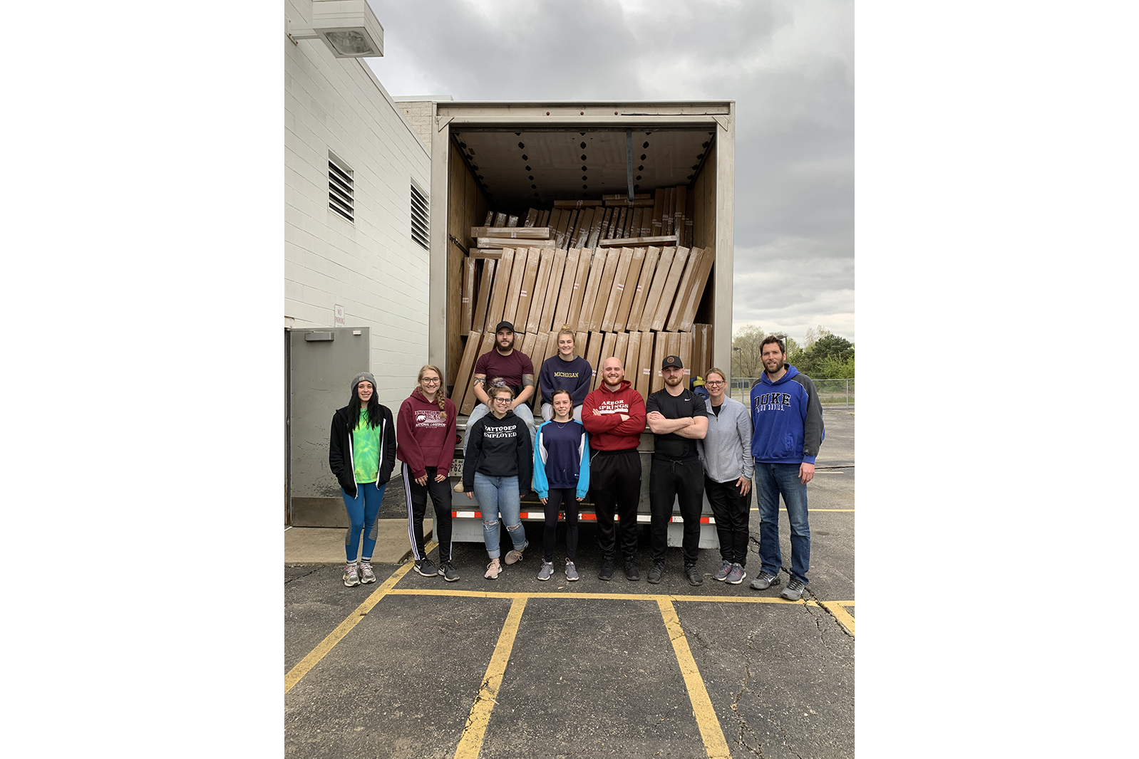 BankSupplies staff after finishing packing a truck full of germ shields.