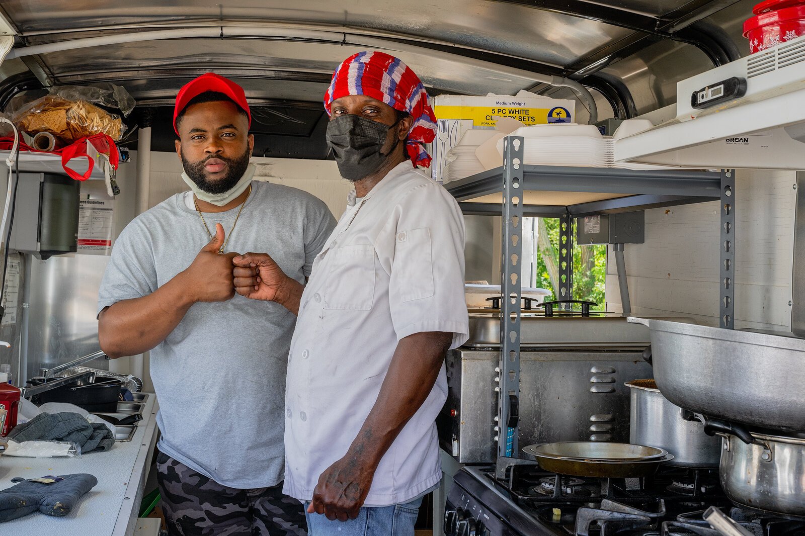 Donandre McNish and Valancio Bailey in the Jamaican Spice food truck.