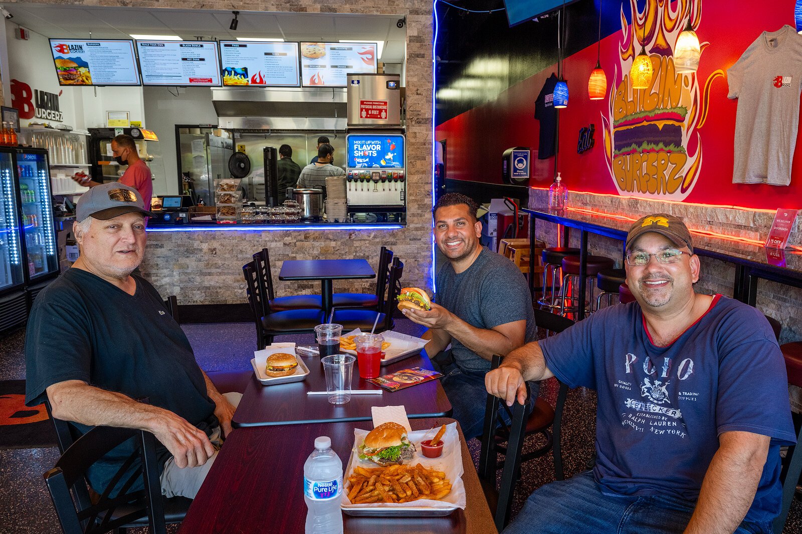 Customers enjoying lunch at Blazin' Burgerz.