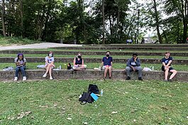 Left to right, students Goddess Smith and Louisa Stuhee; facilitator Angela Knight; and students Connor Sabo-LaPorte, Jaylin Wilson, and Elvin Sahijdak at the first youth data collection meeting for the One Love Symposium.