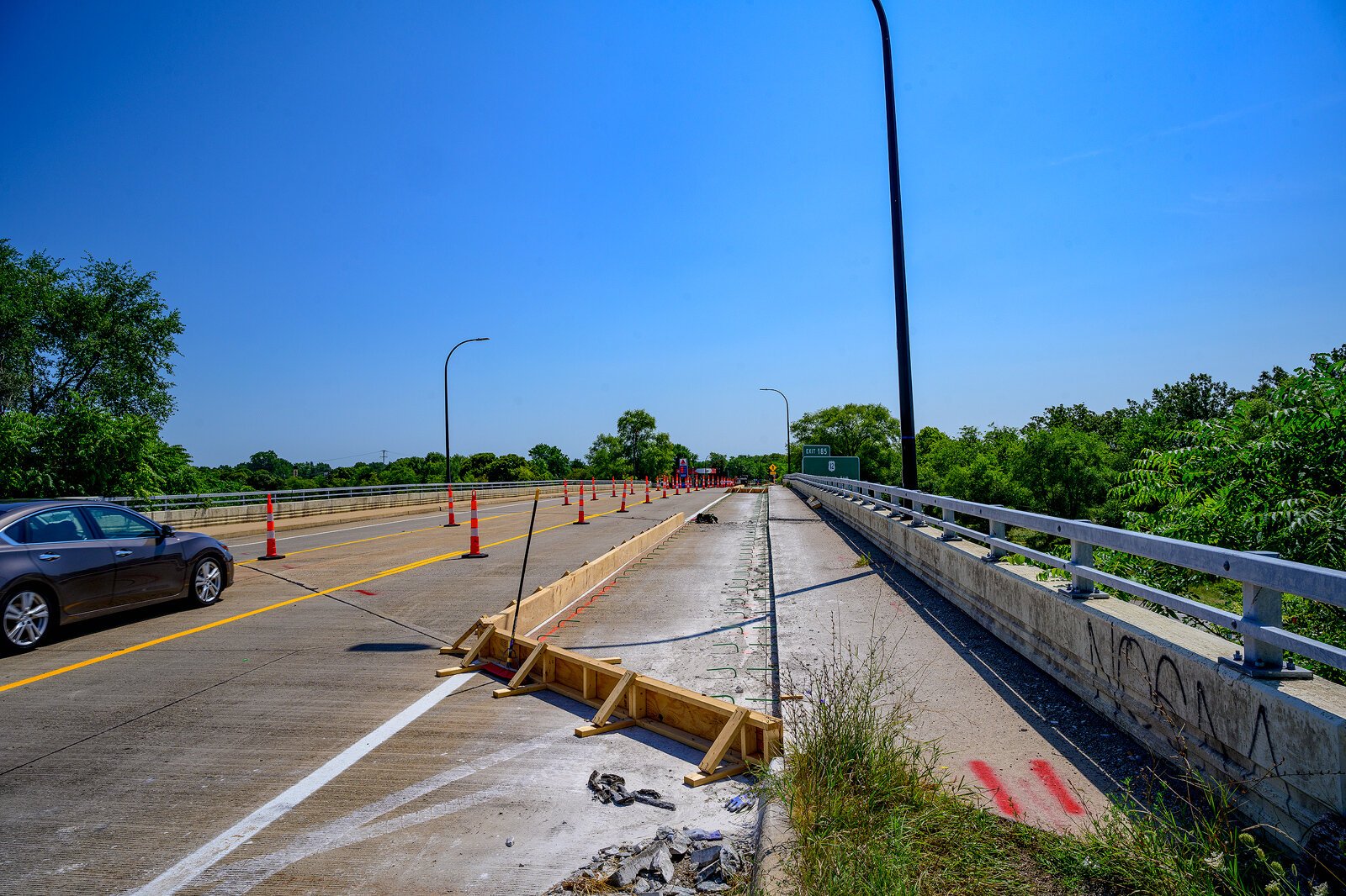 Widening the trail on South Grove crossing I-94.