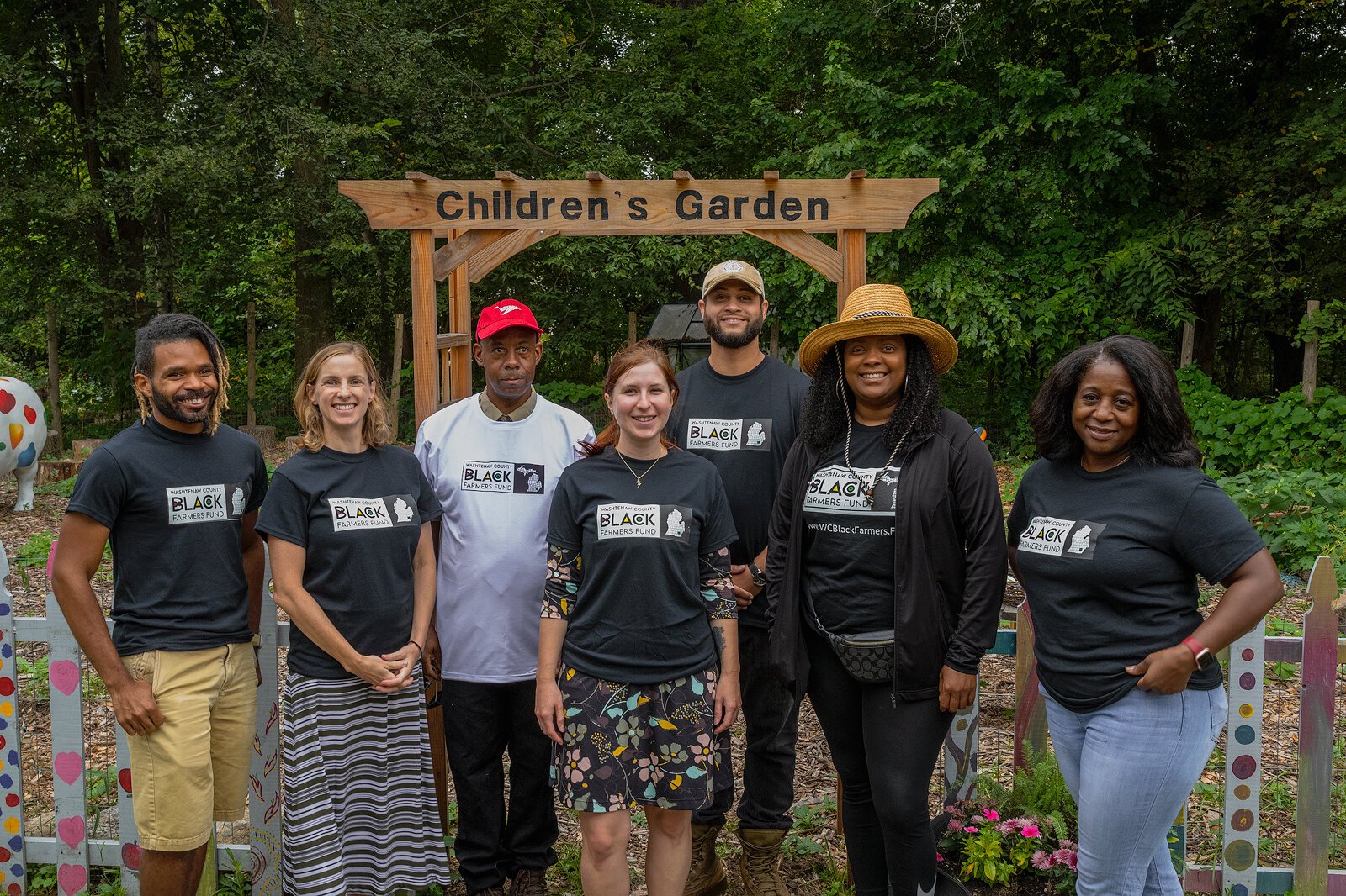 Julius Buzzard, Jae Gerhart, TC Collins, Larrea Young, Josh McAllister, Keesa Johnson, and Lolita Nunn at Growing Hope.