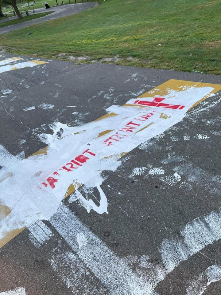 The Black Lives Matter mural was vandalized with white paint and a stencil reading "Patriot Front U.S."