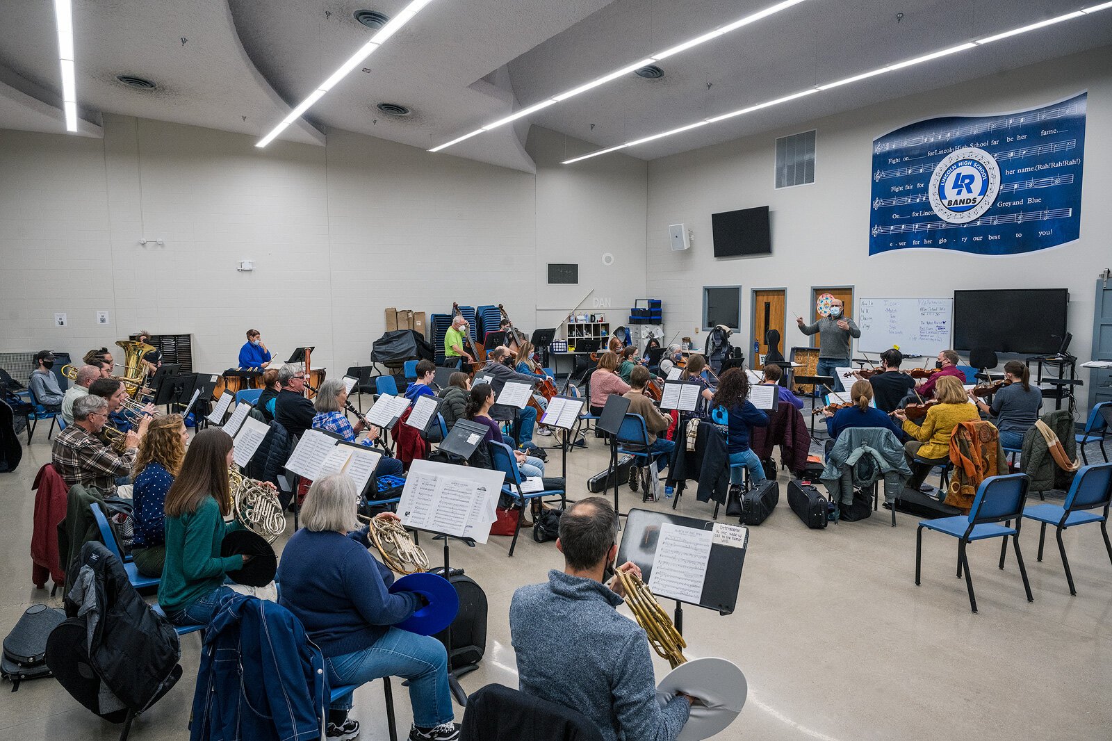 The Ypsilanti Symphony Orchestra rehearses at the Lincoln High School Performing Arts Center.