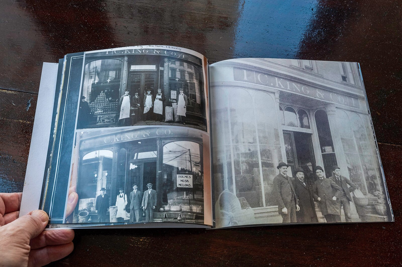 A book of historic photos from the C. King & Co. Cafe building.