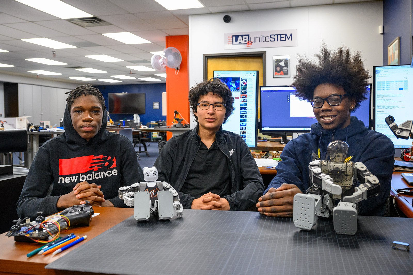 UniteSTEM students Grace Kiba, Noah Gonzalez, and DeShawn Chambers.