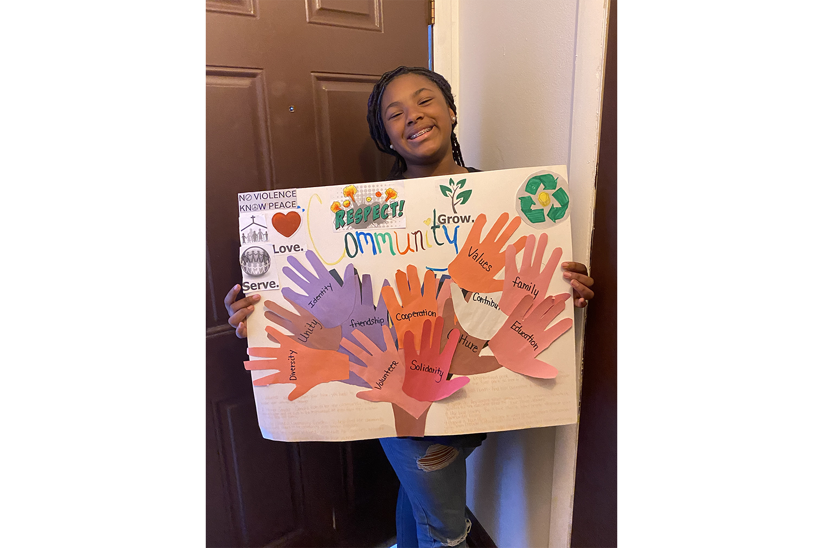 Autumn Crump holds her poster.