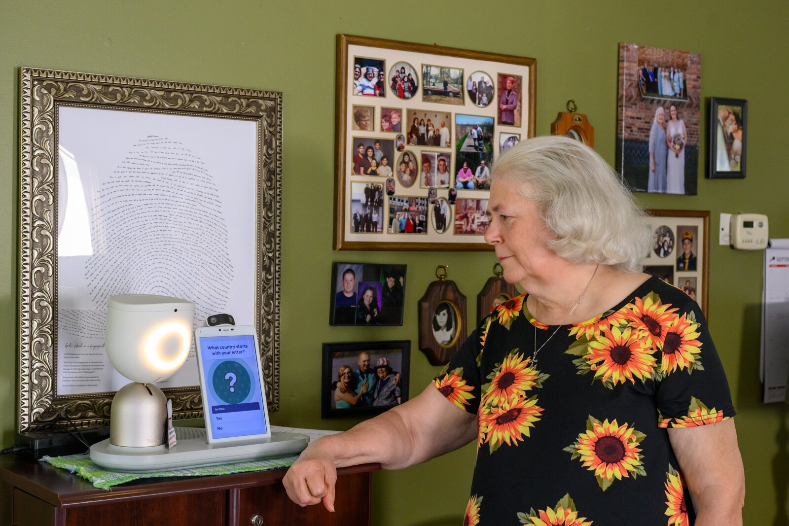 Janis Keller with her ElliQ unit.