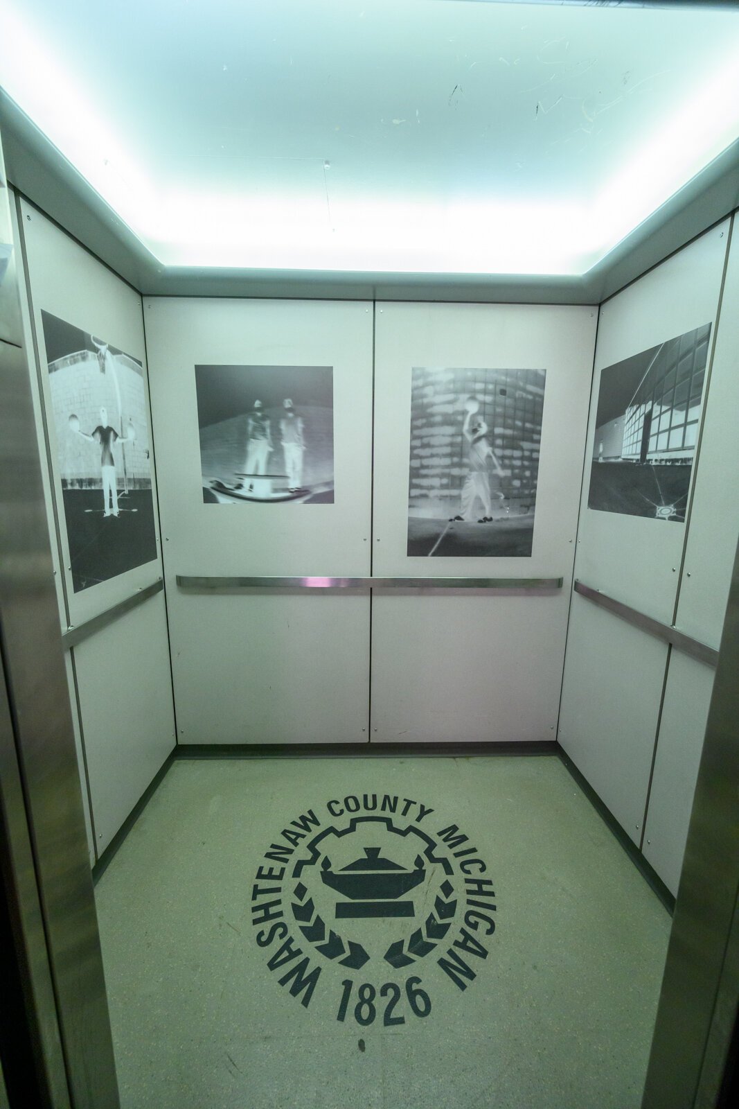 The RE:CLAIM Project exhibit being installed at the Washtenaw County Courthouse.