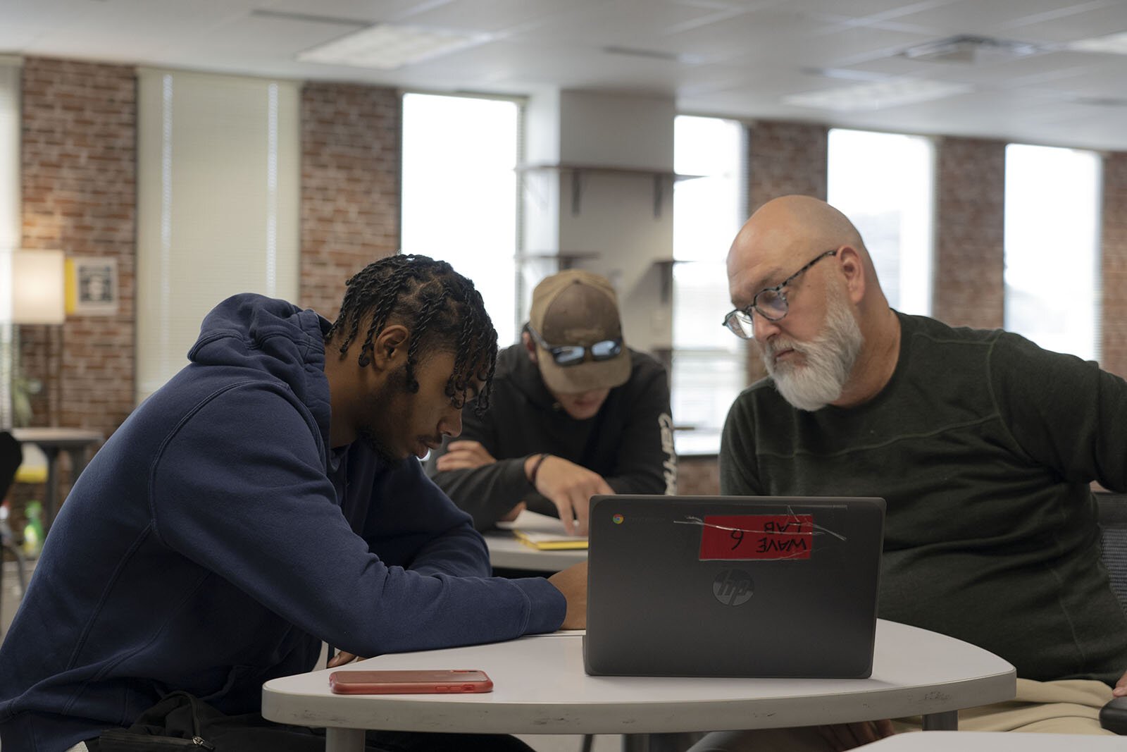 Students and a teacher in the current WAVE high school program.