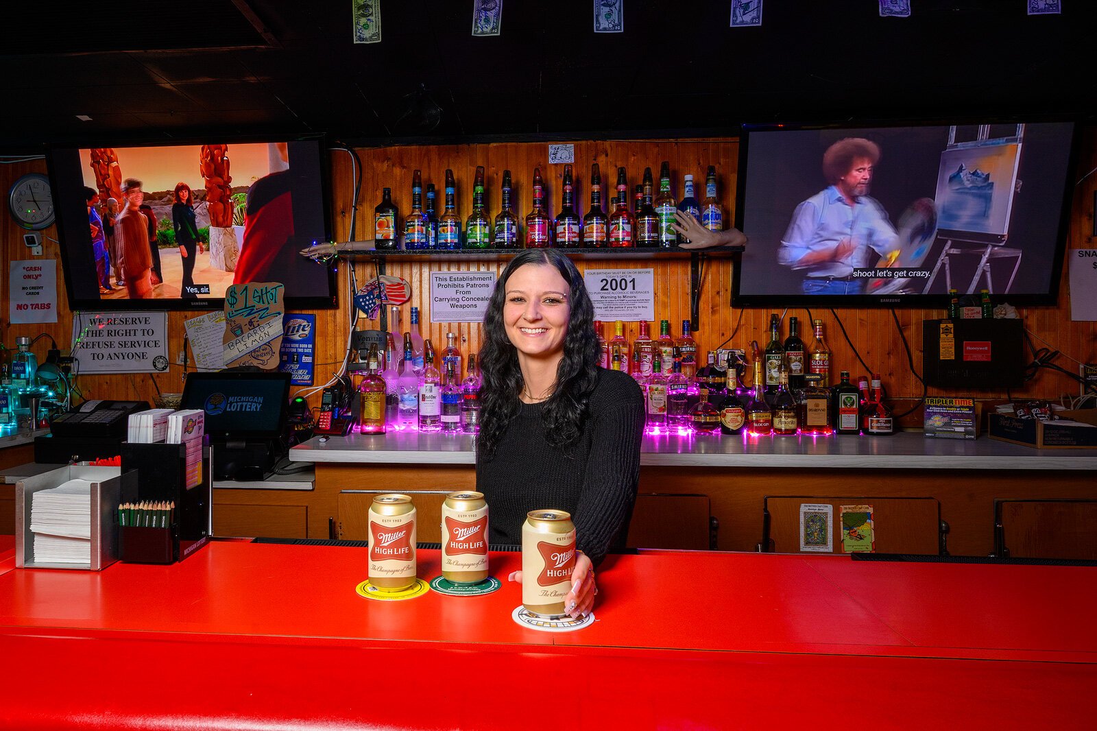 Heather List tending bar at The Regal Beagle.