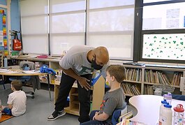 Parapro and Ypsilanti resident Justin Harper is participating in a new program to gain his teaching certificate.