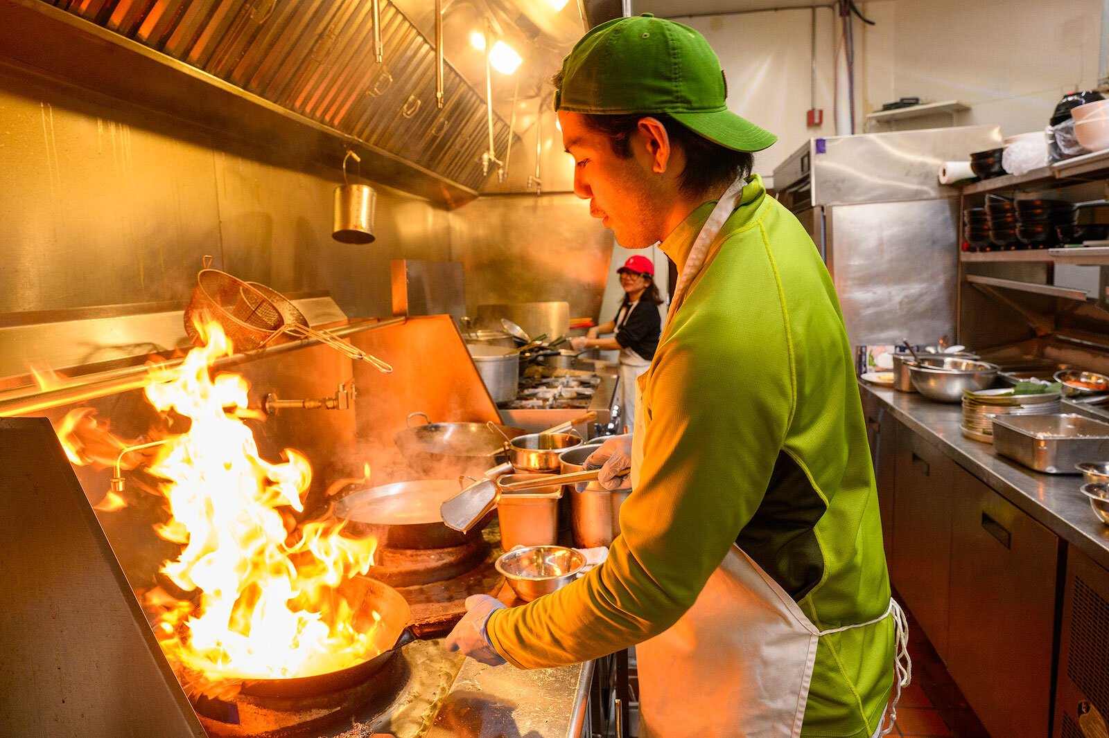 Anthony Atilo preparing a dish at Basil Babe.