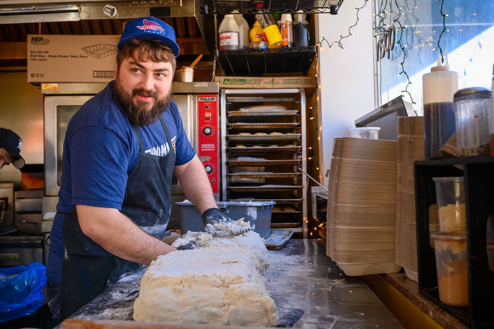 Side Biscuit owner Jordan Balduf getting ready for Super Bowl Sunday.