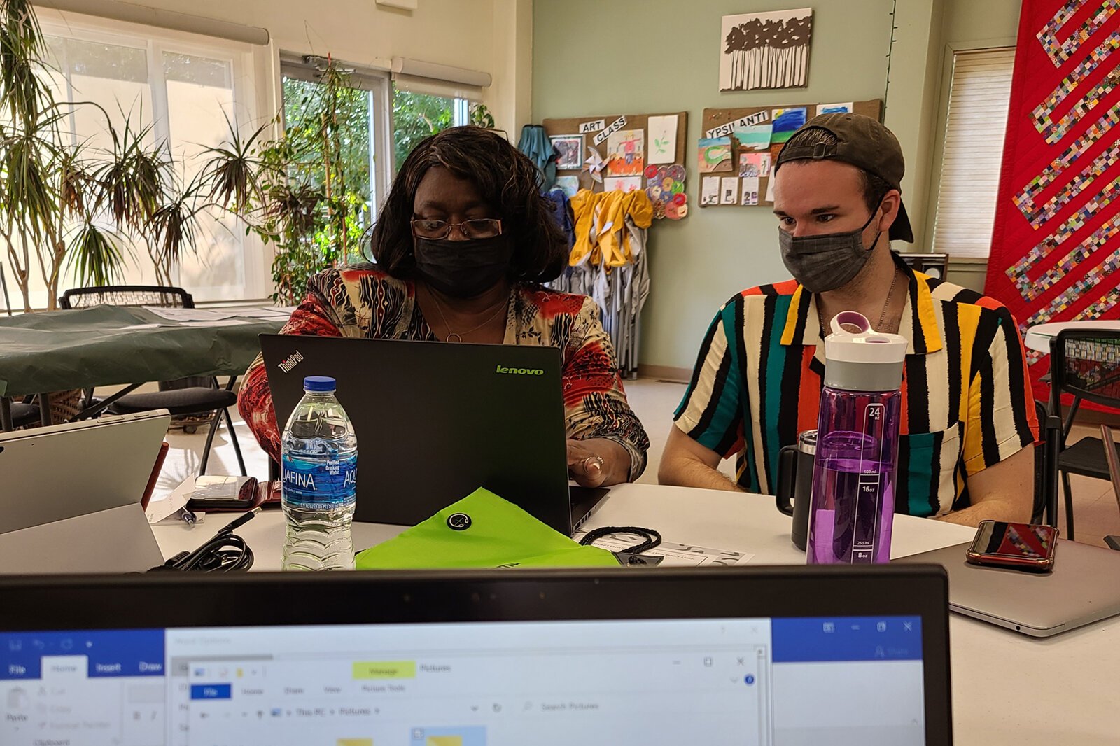 Participants Brenda and Tyler at the Digital Connecting Corps program, held by Engage@EMU at the Ypsilanti Senior Center.