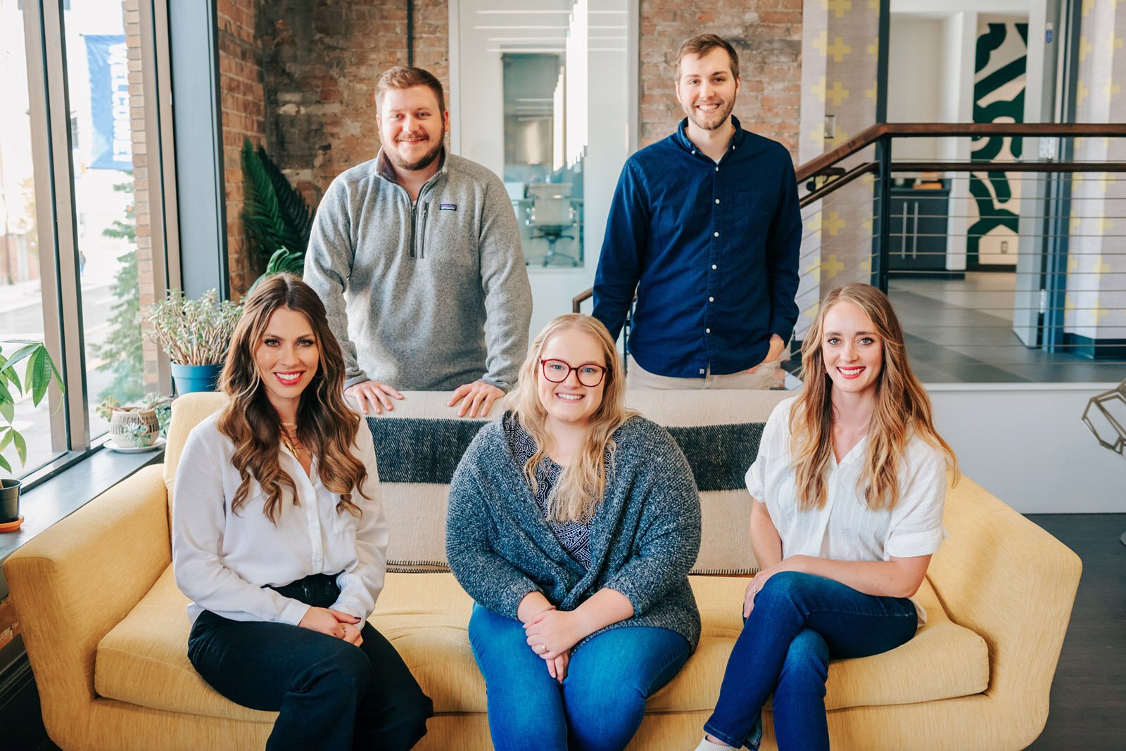 The Metric Marketing team, with founder and CEO Hannah McNaughton at lower left.