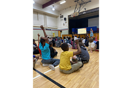 Students at Erickson Elementary take place in an assembly introducing the My Future Fund program.