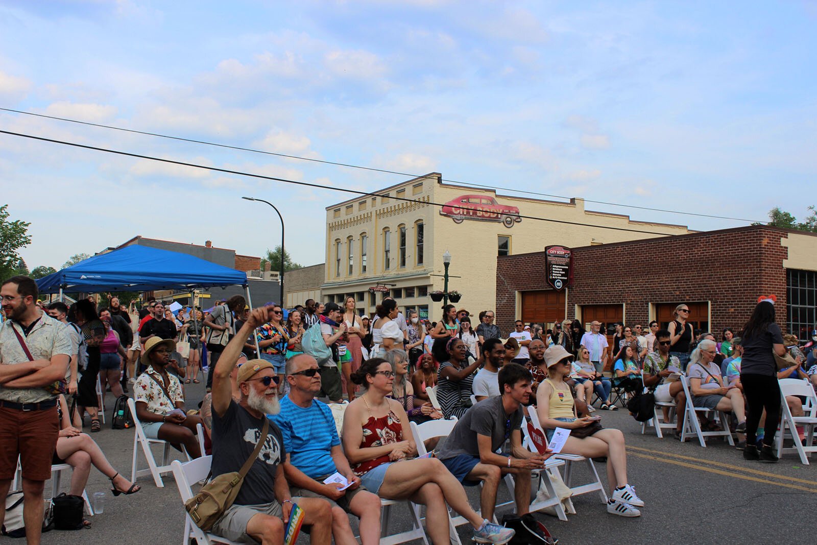After perusing vendors on Cross Street, a crowd forms at Pride’s Cross Street stage to enjoy live music and entertainment.