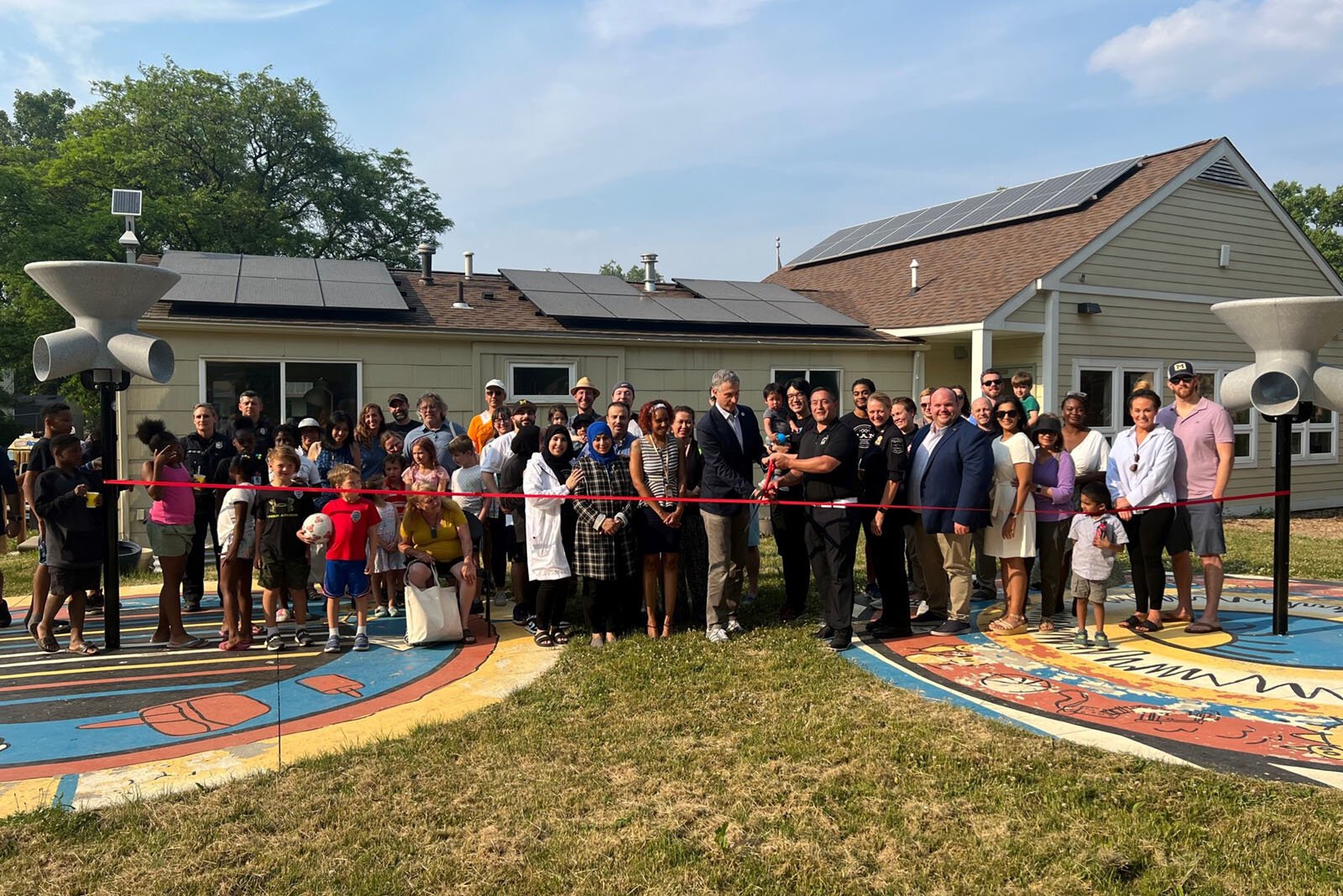 The ribbon-cutting ceremony at the Bryant Community Center resilience hub.